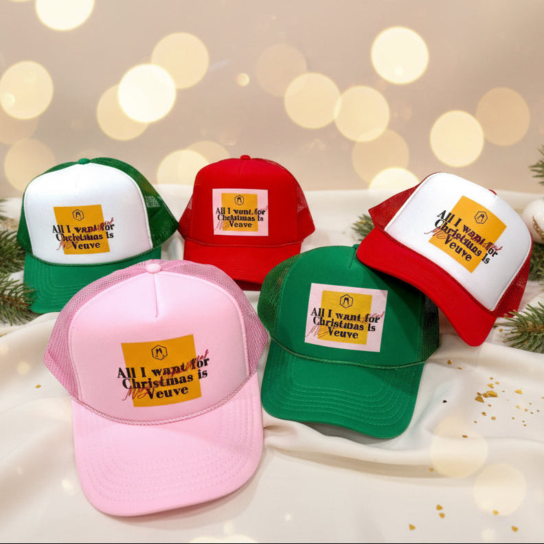 Champagne-themed Christmas trucker hats in holiday colors