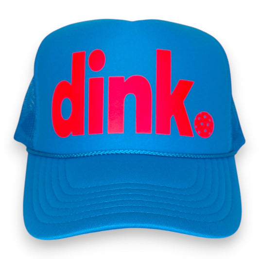 Pickleball trucker hat with word "dink" in lowercase in neon coral. The perfect accessory for a match or gift by stevi.