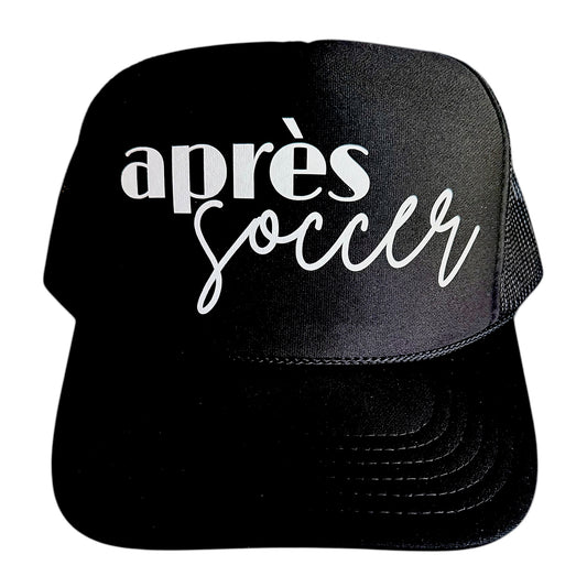 Black foam, snapback trucker hat with Apres Soccer in lowercase font with script by stevi.