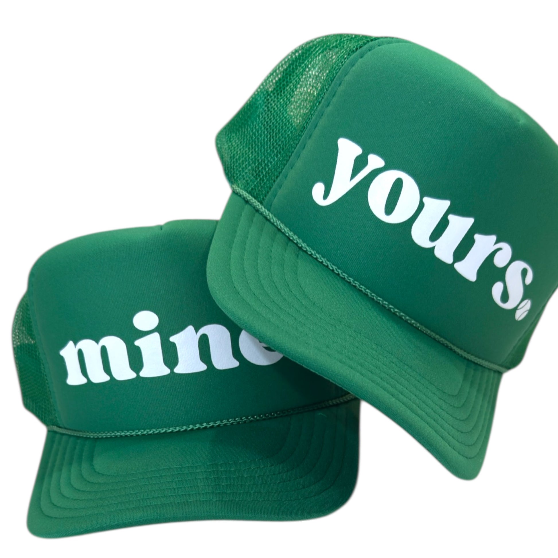 Green “mine” and “yours” tennis trucker hats, matching green foam mesh snapback caps with white script lettering