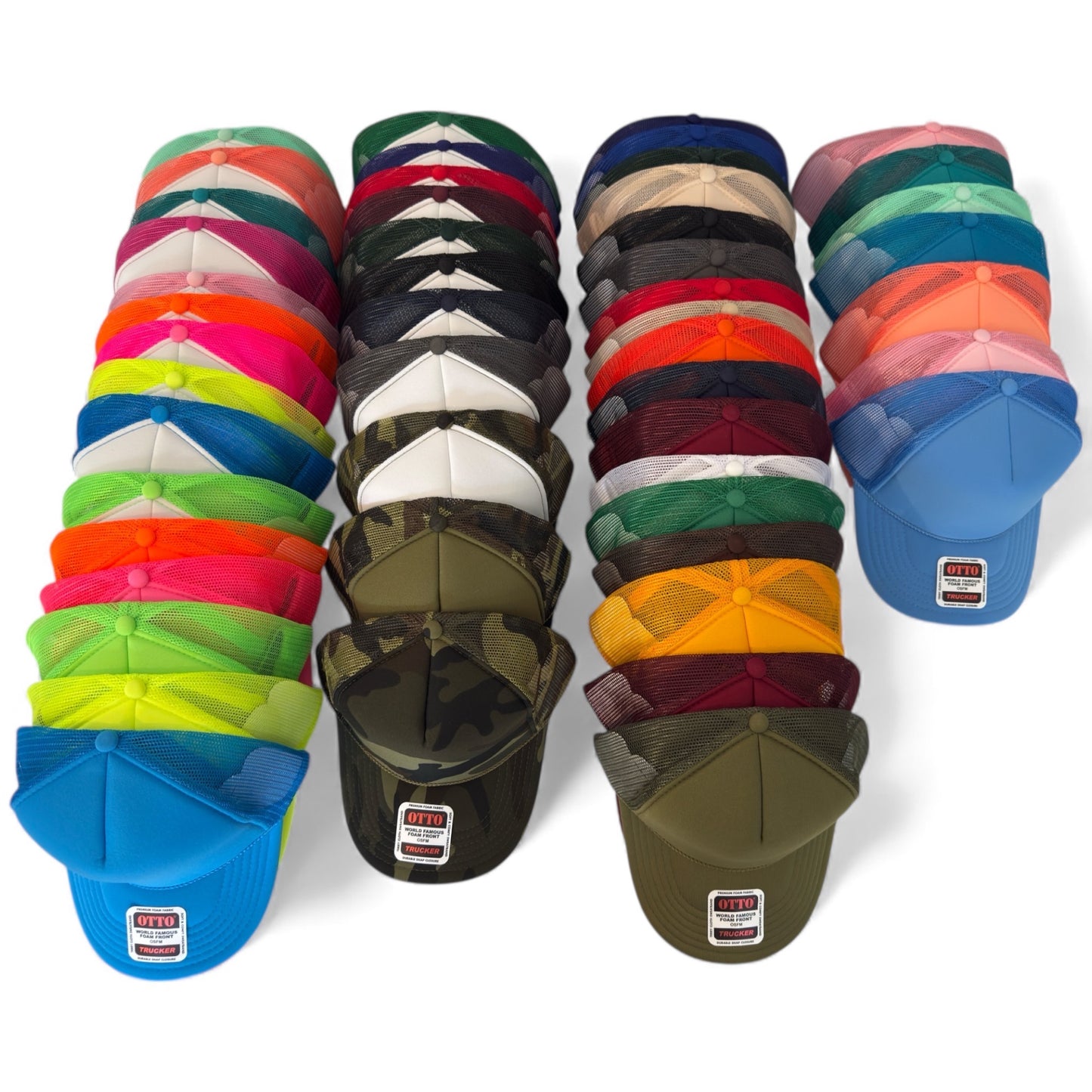 Rows of Otto 39-165 foam trucker hats in assorted colors and camo, mesh snapback caps showing full color options for custom printed hats