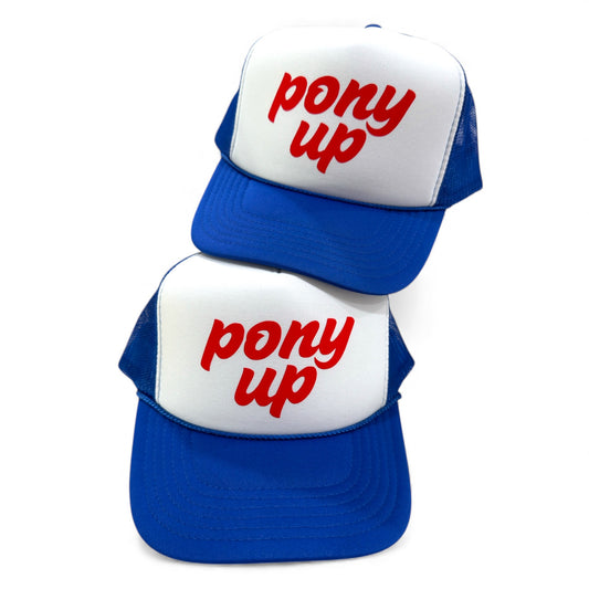 Pony Up logo in lowercase script in red on white and royal blue otto foam trucker hat. Unisex and adjustable snapback perfect for gameday.