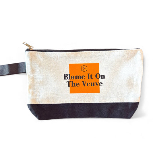 Pouch with 'Blame It On The Veuve' text on a white background.