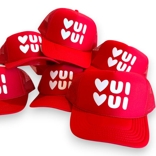 Red trucker hats with Oui Oui love trucker hat. French chic and festive for valentines day, a Parisian trip or for fun!