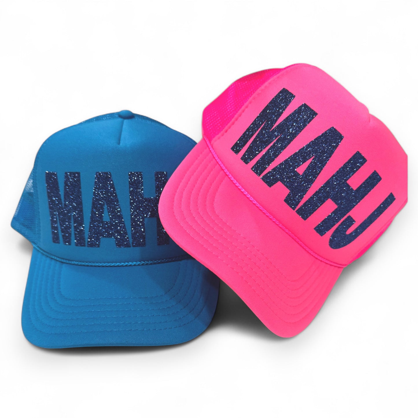 Two hats, one blue and one pink, with 'MAHJ' for Mahjong in block text on a white background