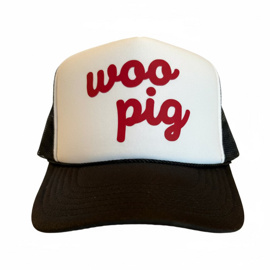 Trucker hat with woo pig in script. Black and white with red ink.